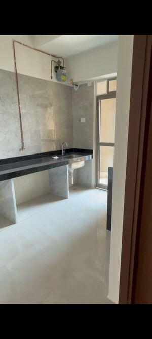 Kitchen in 2 BHK Apartment at Sheth Auris Bliss, Malad West – for Sale