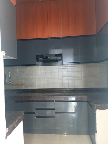 Kitchen in 2.5 BHK Apartment at Ace Divino, Sector 1 Greater Noida – for Rent