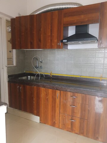 Kitchen in 2 BHK Apartment at Ace Divino, Sector 1 Greater Noida – for Rent