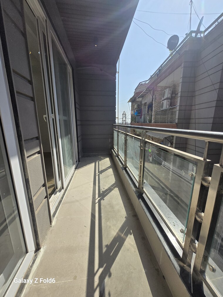 Balcony, risland-sky-mansion 2 Bedroom 1000 Sq.Ft. Builder Floor In Chattarpur Delhi 10078302
