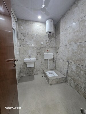Bathroom in 2 BHK Builder Floor at Risland Sky Mansion, Chattarpur – for Rent