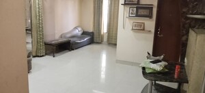 Living Room in 2.5 BHK Apartment at Model Colony – for Rent