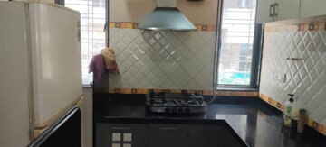 Kitchen in 2.5 BHK Apartment at Model Colony – for Rent