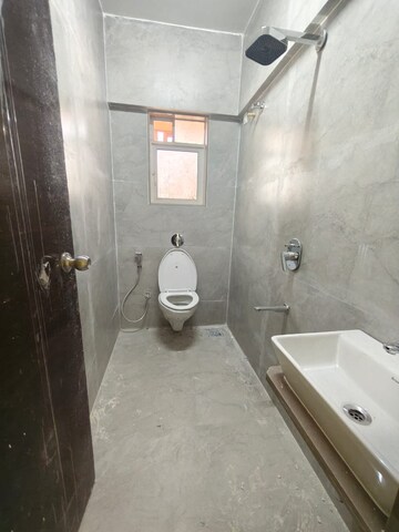 Bathroom in 2 BHK Apartment at Elite The Crown, Tilak Nagar – for Rent