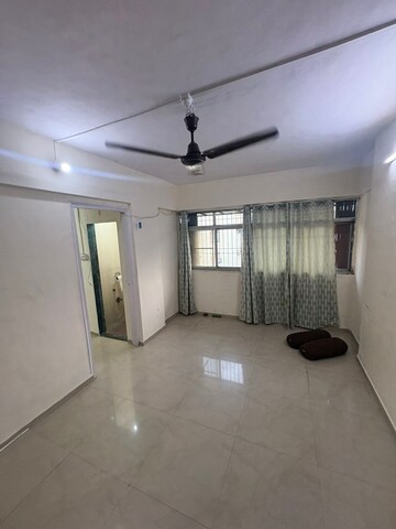 Room in 1 BHK Apartment at Nirlon Family CHS, Malad West – for Rent