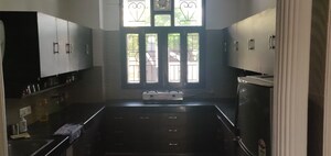 Kitchen in 4 BHK Builder Floor at Sushant Lok I – for Rent