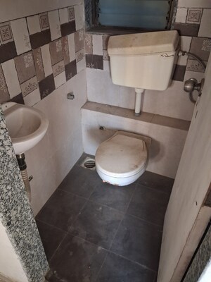 Bathroom in 1 BHK Apartment at Pulkit CHS, Andheri West – for Rent