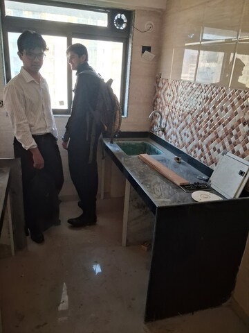 Living Room in 1 BHK Apartment at Pulkit CHS, Andheri West – for Rent