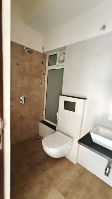 Bathroom in 1 BHK Apartment at Omkar Signet, Malad East – for Rent