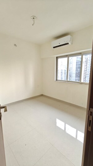 Room in 1 BHK Apartment at Omkar Signet, Malad East – for Rent