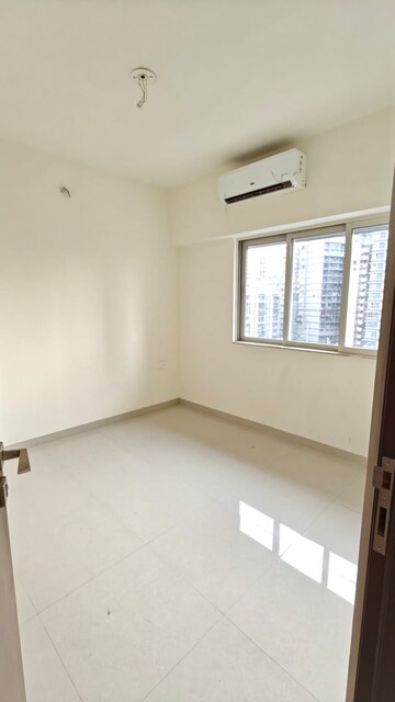 Room in 1 BHK Apartment at Omkar Signet, Malad East – for Rent