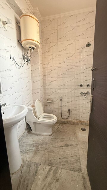 Bathroom in 2 BHK Builder Floor at Chattarpur – for Rent
