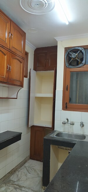 Kitchen in 2 BHK Builder Floor at Khirki Extension – for Rent