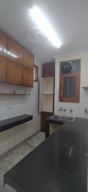 Kitchen in 2 BHK Builder Floor at Khirki Extension – for Rent