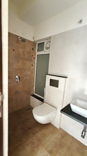 Bathroom in 2 BHK Apartment at Omkar Signet, Malad East – for Rent