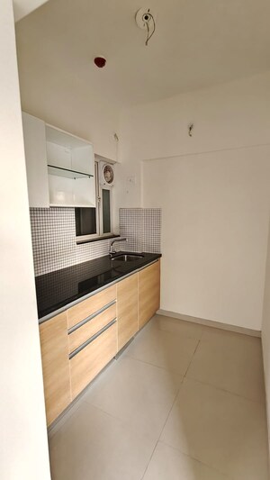 Kitchen in 2 BHK Apartment at Omkar Signet, Malad East – for Rent