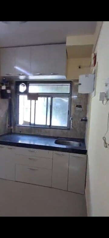 Kitchen in 2 BHK Apartment at Millie Enclave, Malad West – for Rent
