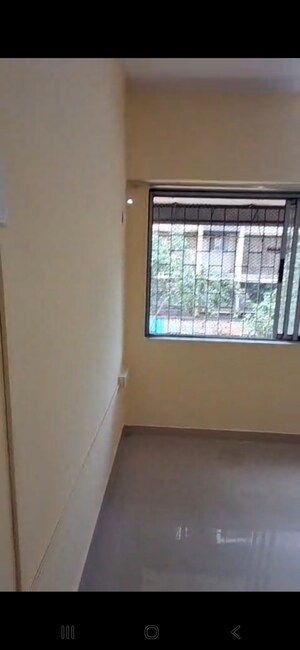 Bedroom in 2 BHK Apartment at Millie Enclave, Malad West – for Rent