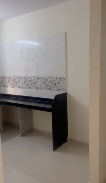 Kitchen in 1 BHK Apartment at Raj Tulsi Aawas, Badlapur East – for Sale