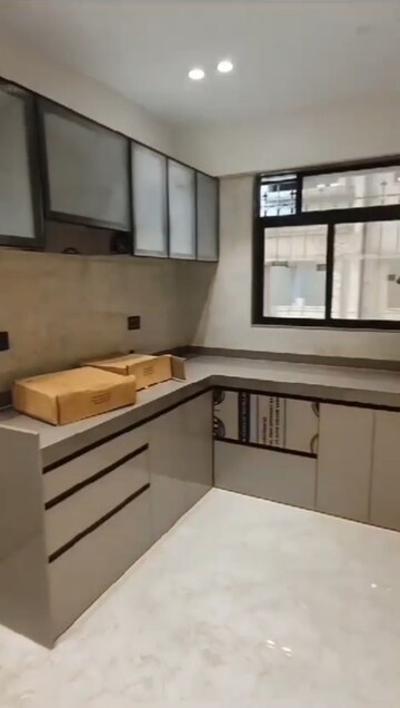 Kitchen in 2 BHK Apartment at Raj Tulsi Aawas, Badlapur East – for Sale