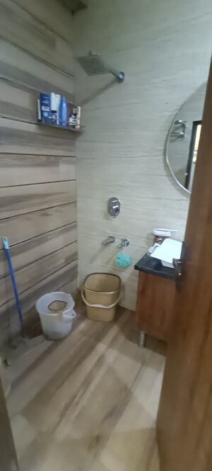 Bathroom in 2 BHK Apartment at Rohini Sector 8 – for Rent