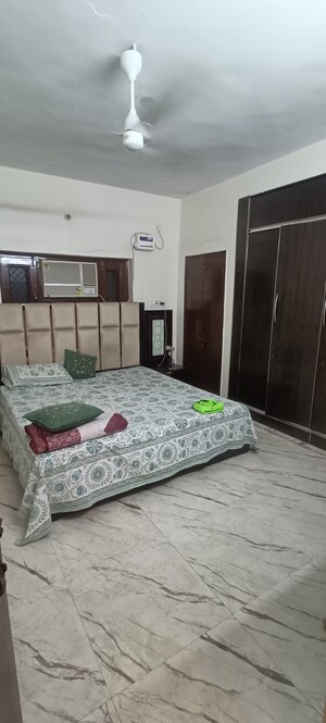 Bedroom in 2 BHK Apartment at Rohini Sector 8 – for Rent