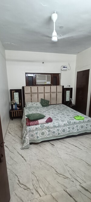 Bedroom in 2 BHK Apartment at Rohini Sector 8 – for Rent