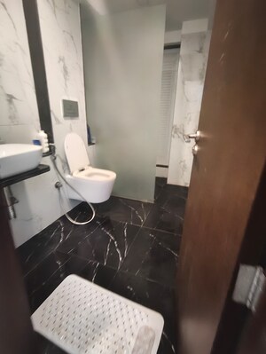 Bathroom in 2 BHK Apartment at Ruparel Ariana, Parel – for Rent