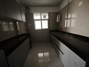 Kitchen in 2 BHK Apartment at Vaibhav Queens Park, Chembur – for Rent