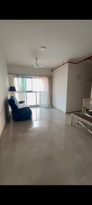 Living Room in 2 BHK Apartment at Sheth Auris Bliss, Malad West – for Rent