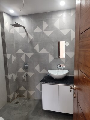 Bathroom in 3 BHK Builder Floor at Freedom Fighters Enclave – for Rent