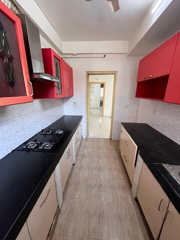 Kitchen in 4 BHK Apartment at Ansal Sushant Estate, Sector 52 – for Rent