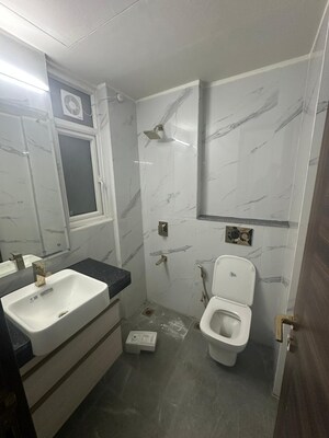 Bathroom in 3 BHK Apartment at Smart World Orchard, Sector 61 – for Rent