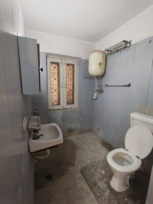 Bathroom in 2 BHK Builder Floor at Pamposh Enclave – for Rent
