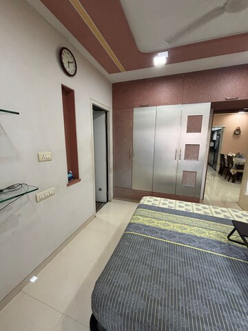 Bedroom in 3 BHK Apartment at Adarsh Whispering Wind CHS, Malad West – for Rent