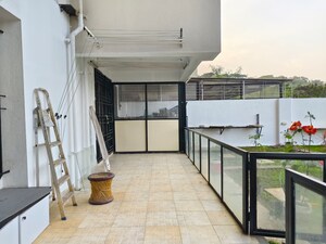 Balcony in 4 BHK Apartment at Mont Vert Belair, Bhugaon – for Rent