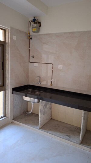 Kitchen in 3 BHK Apartment at Bhutra Mangal Karini Sky Breeze, Goregaon West – for Rent