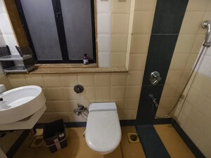 Bathroom in 2 BHK Apartment at Swapnalok Towers, Malad East – for Rent