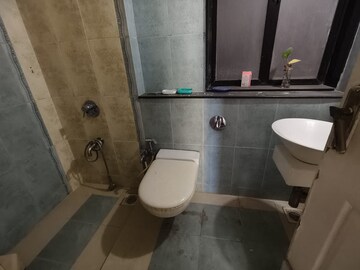 Bathroom in 2 BHK Apartment at Swapnalok Towers, Malad East – for Rent