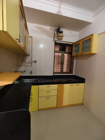 Kitchen in 2 BHK Apartment at Sadguru Complex I, Goregaon East – for Rent