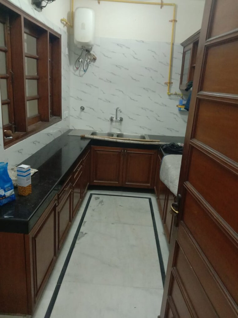 Kitchen, greater kailash ii 3 Bedroom 250 Sq.Yd. Builder Floor In Greater Kailash ii Delhi 10095787