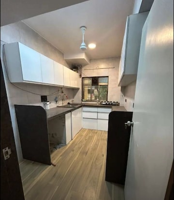 Kitchen in 2 BHK Apartment at Bhag CHS, Shivaji Park – for Rent