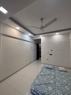 Room in 2 BHK Apartment at Thakur Badrinath Tower, Andheri West – for Rent