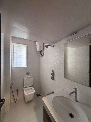 Bathroom in 2 BHK Apartment at Thakur Badrinath Tower, Andheri West – for Rent