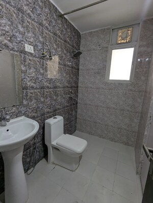Bathroom in 3 BHK Apartment at Mahagun Moderne, Sector 78 – for Rent