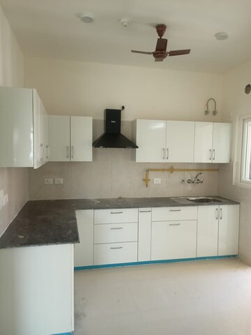 Kitchen in 3 BHK Apartment at Samridhi Luxuriya Avenue, Sector 150 – for Rent