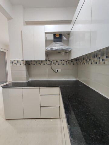 Kitchen in 2 BHK Apartment at Signature Orchard Avenue 2, Sector 93 – for Sale