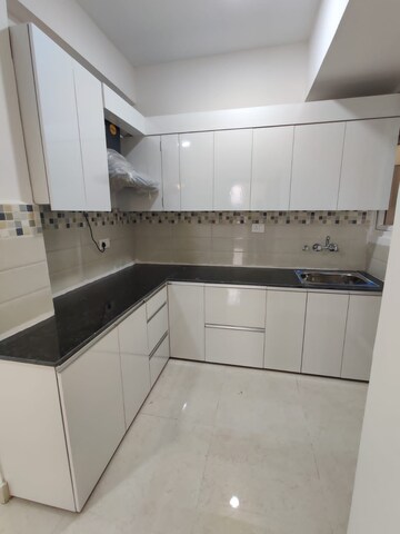 Kitchen in 2 BHK Apartment at Signature Orchard Avenue 2, Sector 93 – for Sale