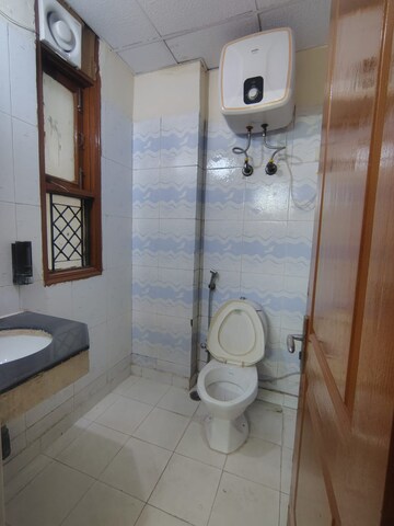 Bathroom in 2.5 BHK Apartment at Rajhans Apartments, Indrapuram – for Sale