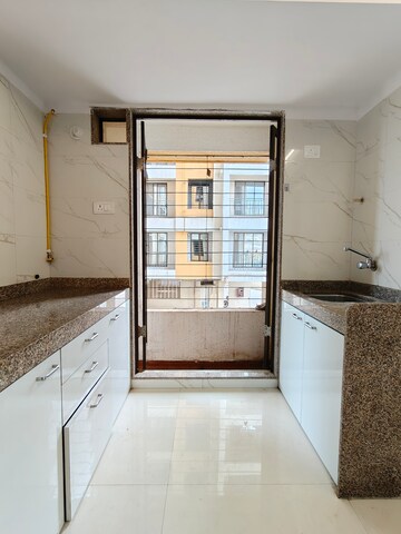 Kitchen in 2 BHK Apartment at Tiara Hills, Mira Road – for Rent